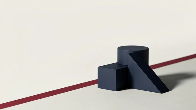 Three navy geometric blocks assembled into one structure on a pale floor, a red stripe behind them.